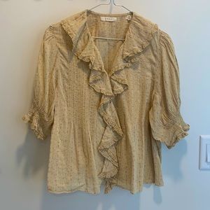 Doen short sleeve.  Cream towards golden color.   Pink flowers on green vine.